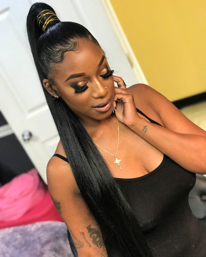 high sleek ponytail with metal accessories