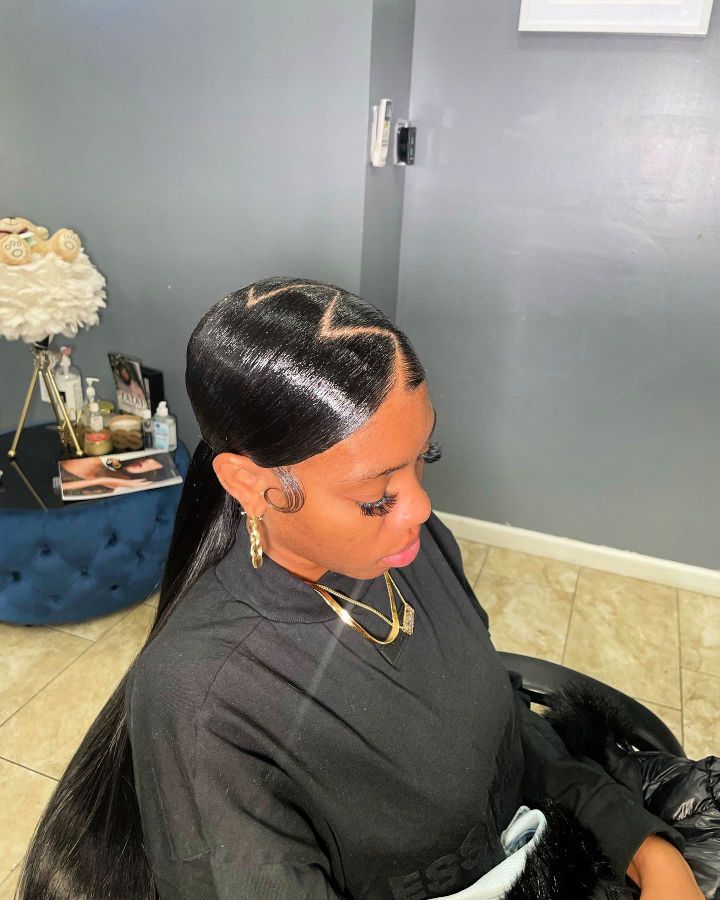 zig zag part ponytail hairstyle for black women