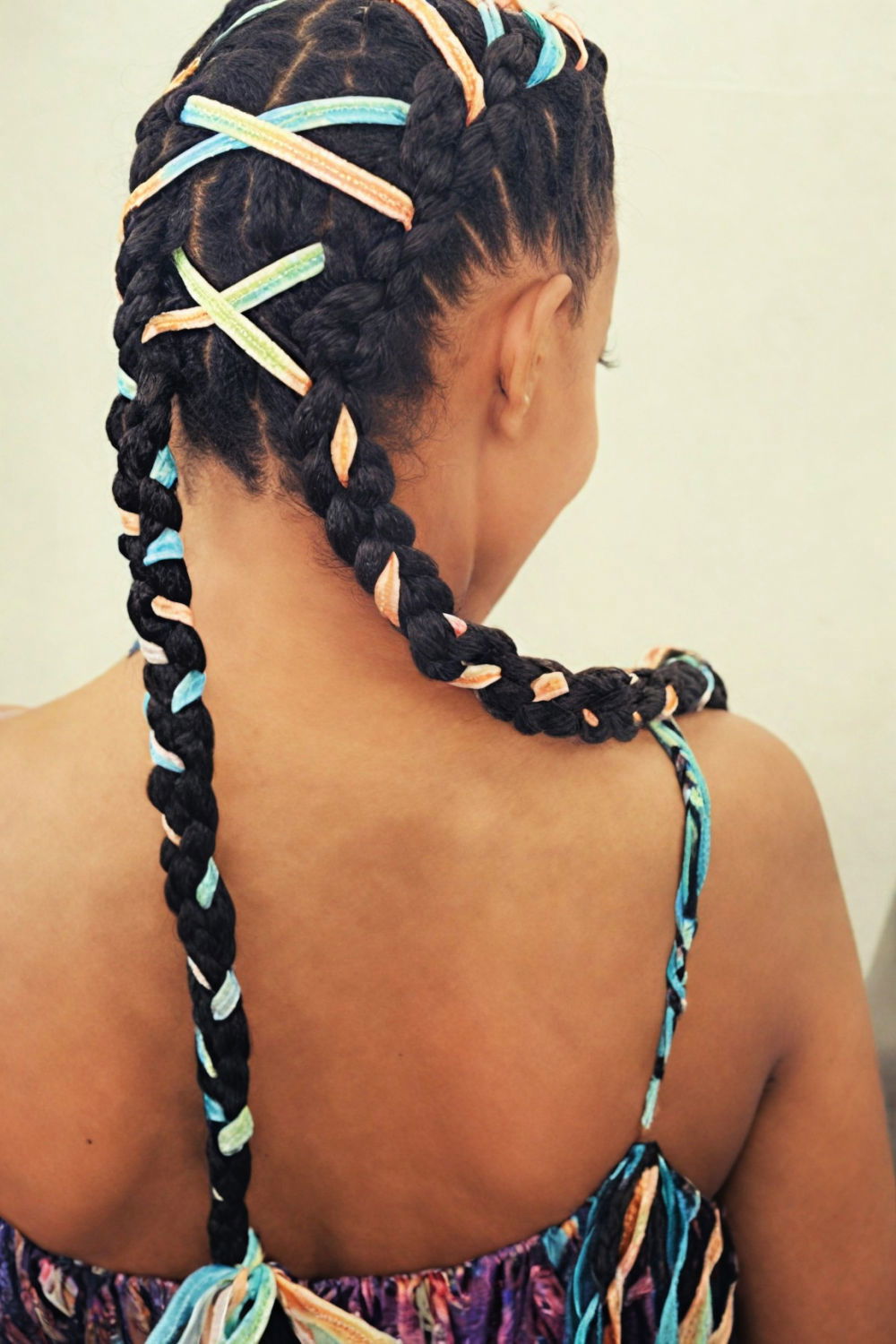 box braids with colorful ribbon interlaced