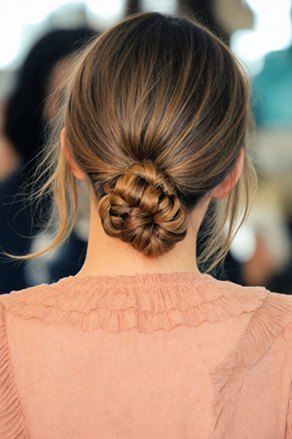 fishtail braid low bun hairstyle