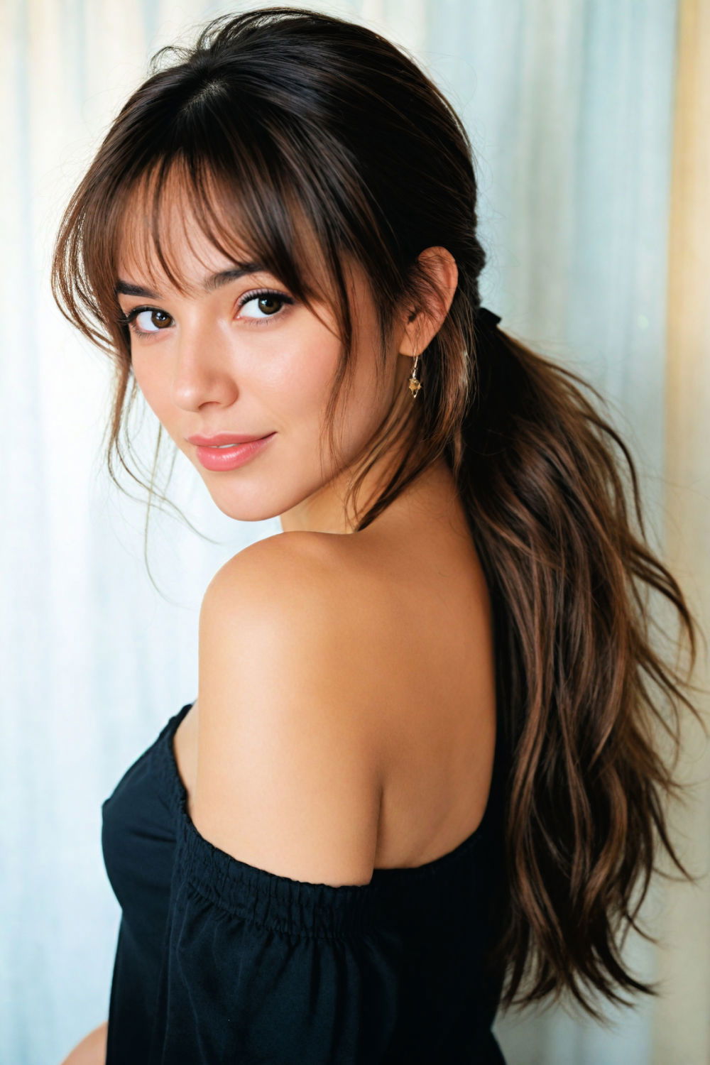 low ponytail with curtain bangs