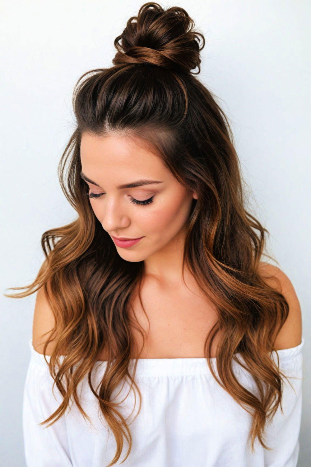 tousled half bun for medium length hair