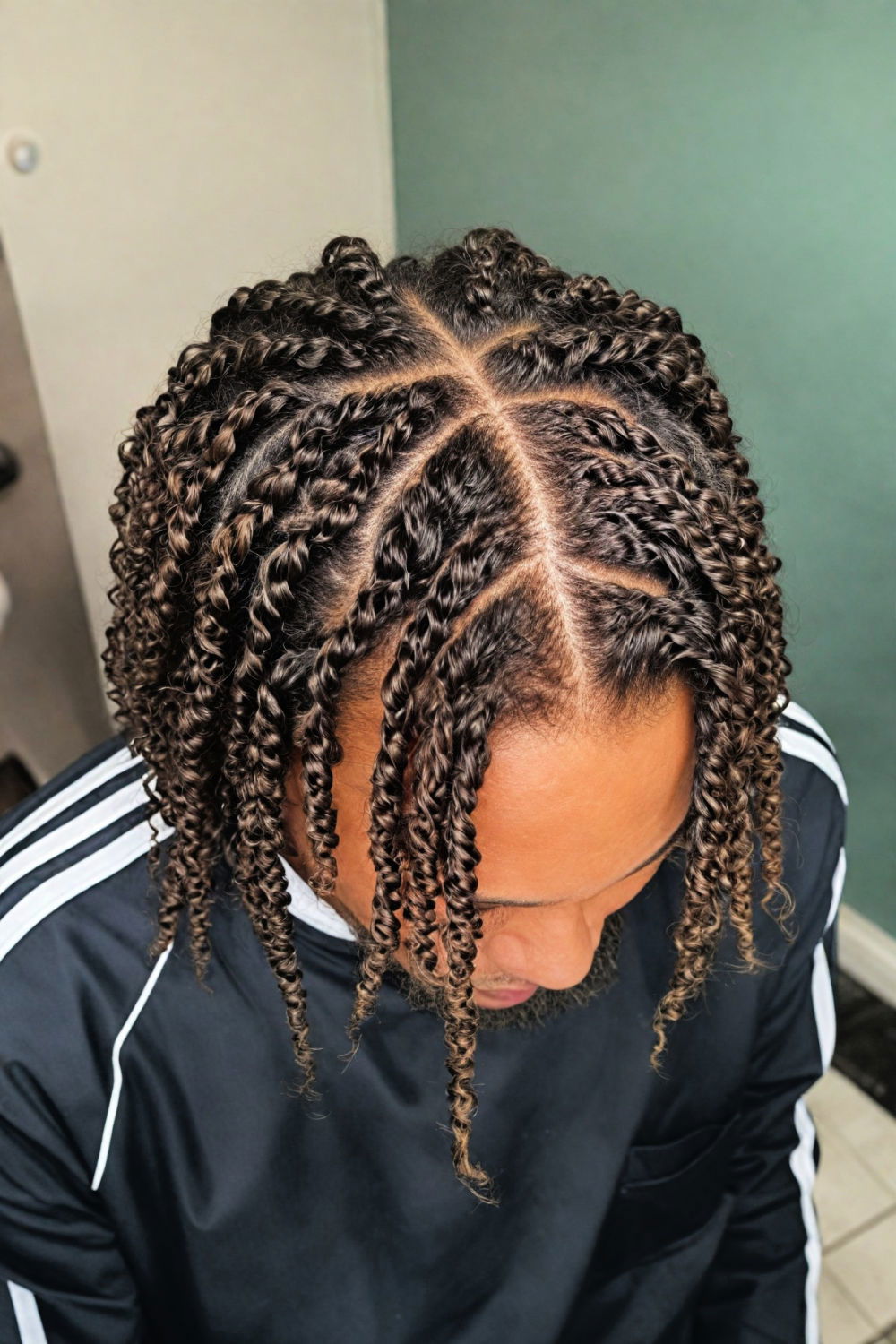twists medium length hairstyle for men
