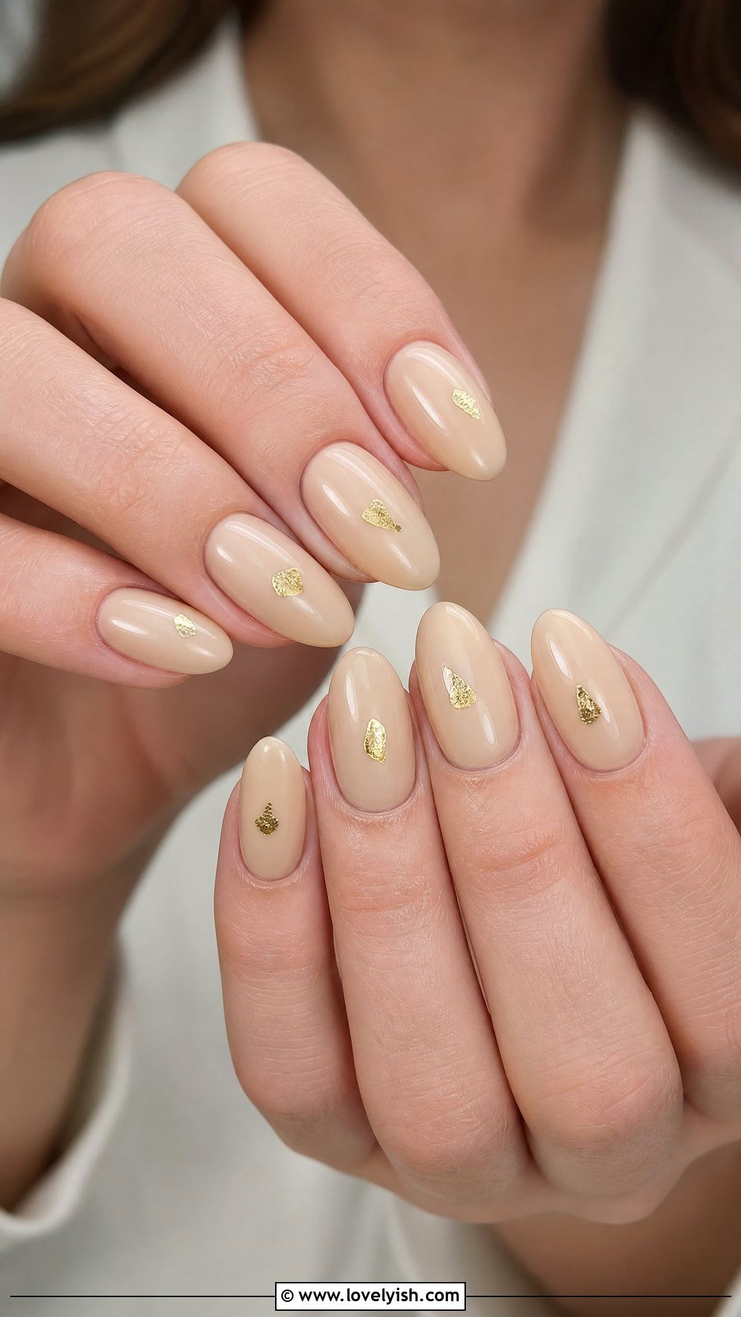 Beige Nails with Single Gold Foil Flake - 42 minimalist nail art - 42 minimalist nail art