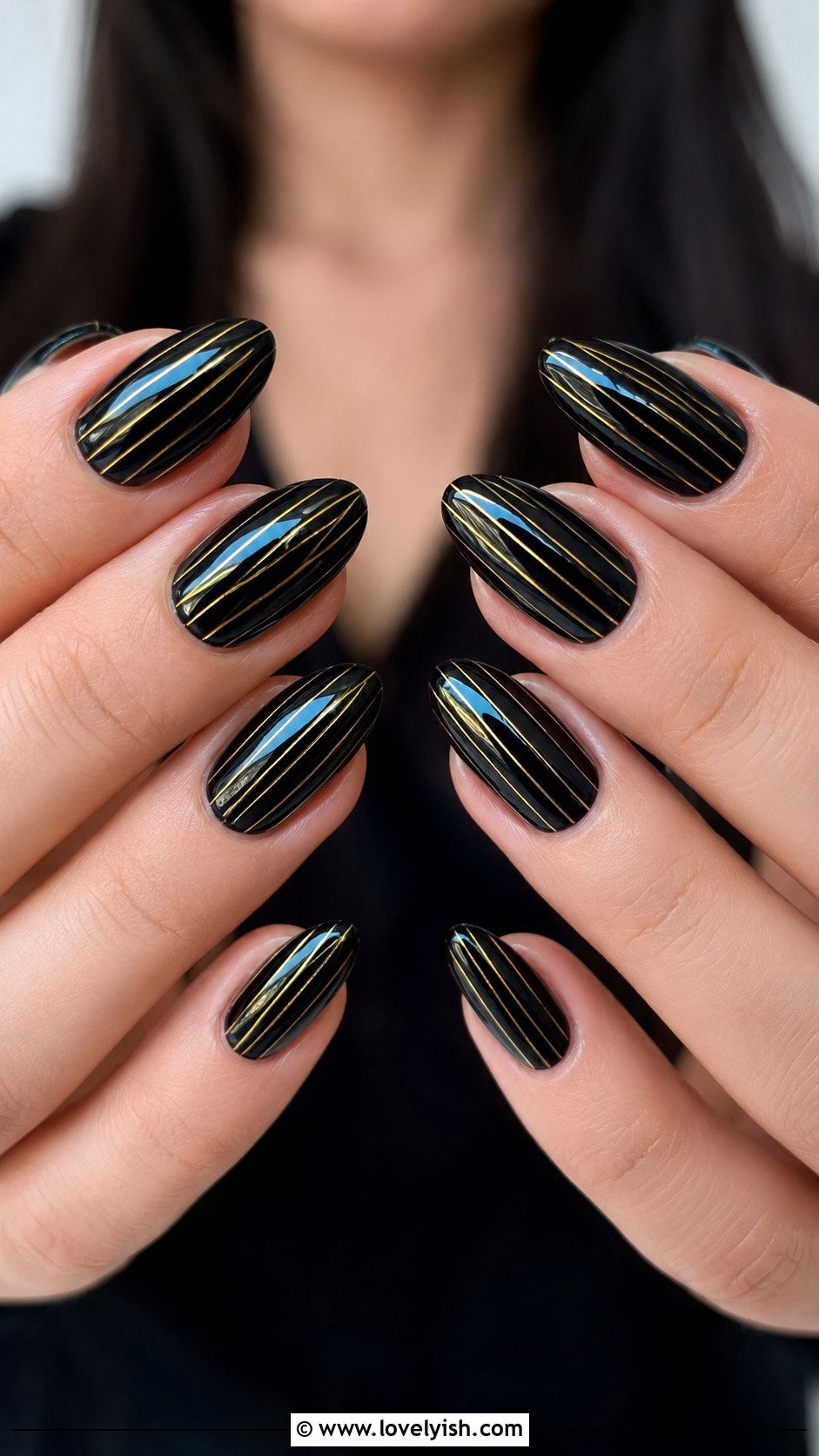 Black Almond Nails with Gold Pinstripes - 50 black and gold nail designs - 50 black and gold nail designs