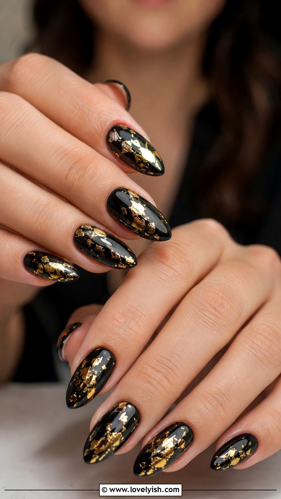 Black Gel Nails with Gold Leaf Detail - 50 black and gold nail designs - 50 black and gold nail designs
