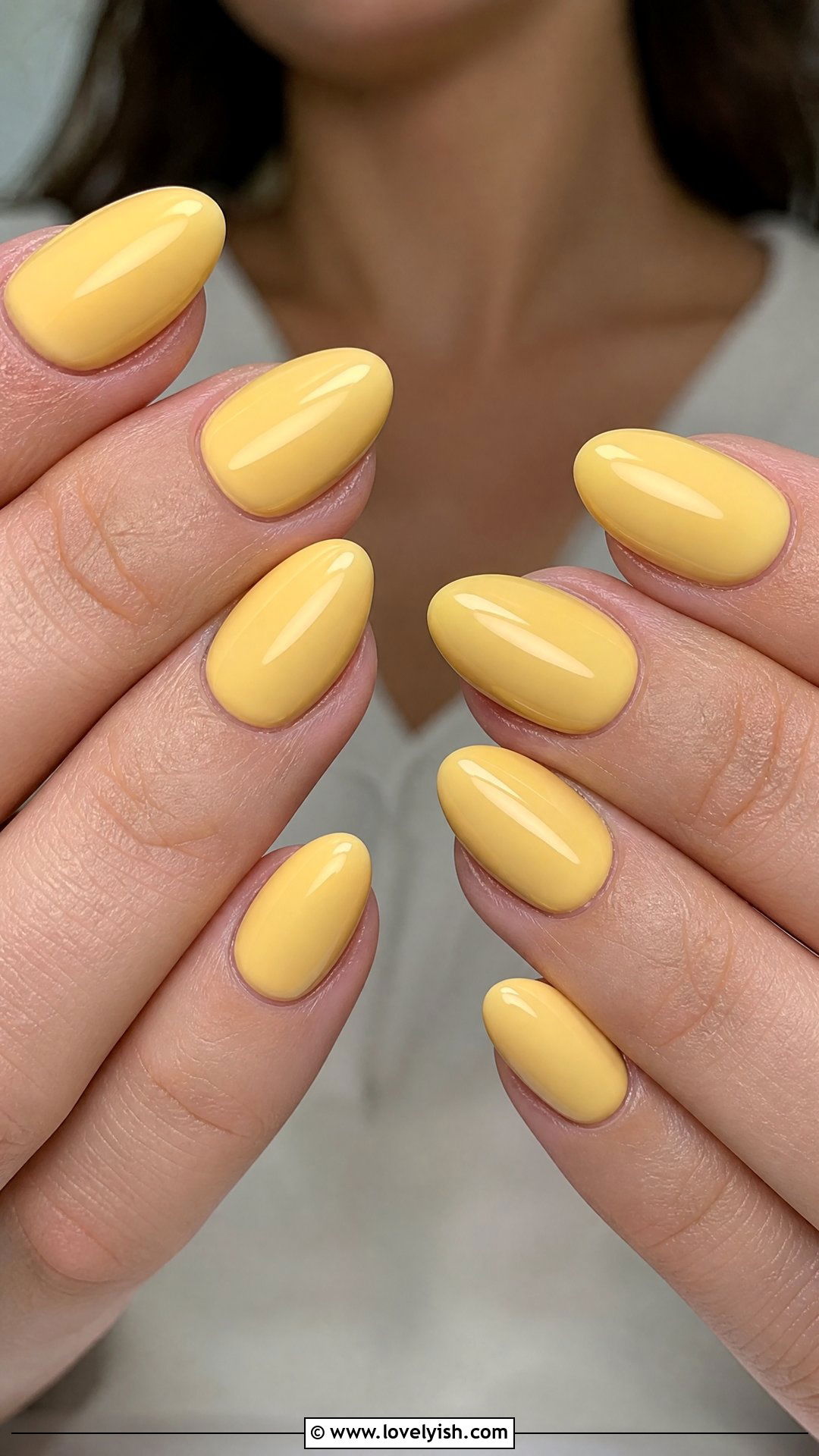 Butter Yellow Glossy Almond Nails - 50 easy spring nail designs - 50 easy spring nail designs