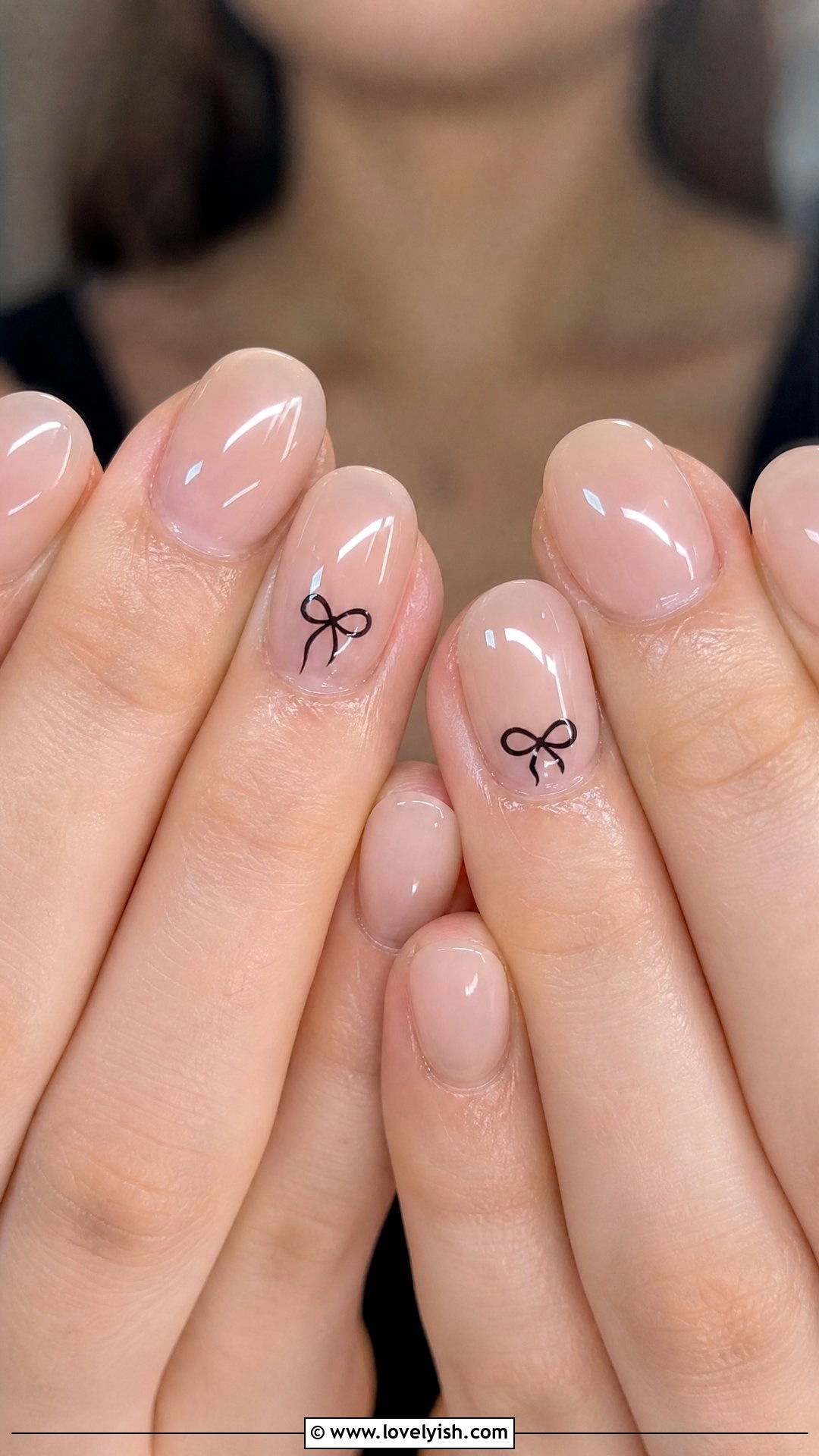 Clear Glossy Nails with Tiny Bow - 33 minimalist nail designs - 33 minimalist nail designs
