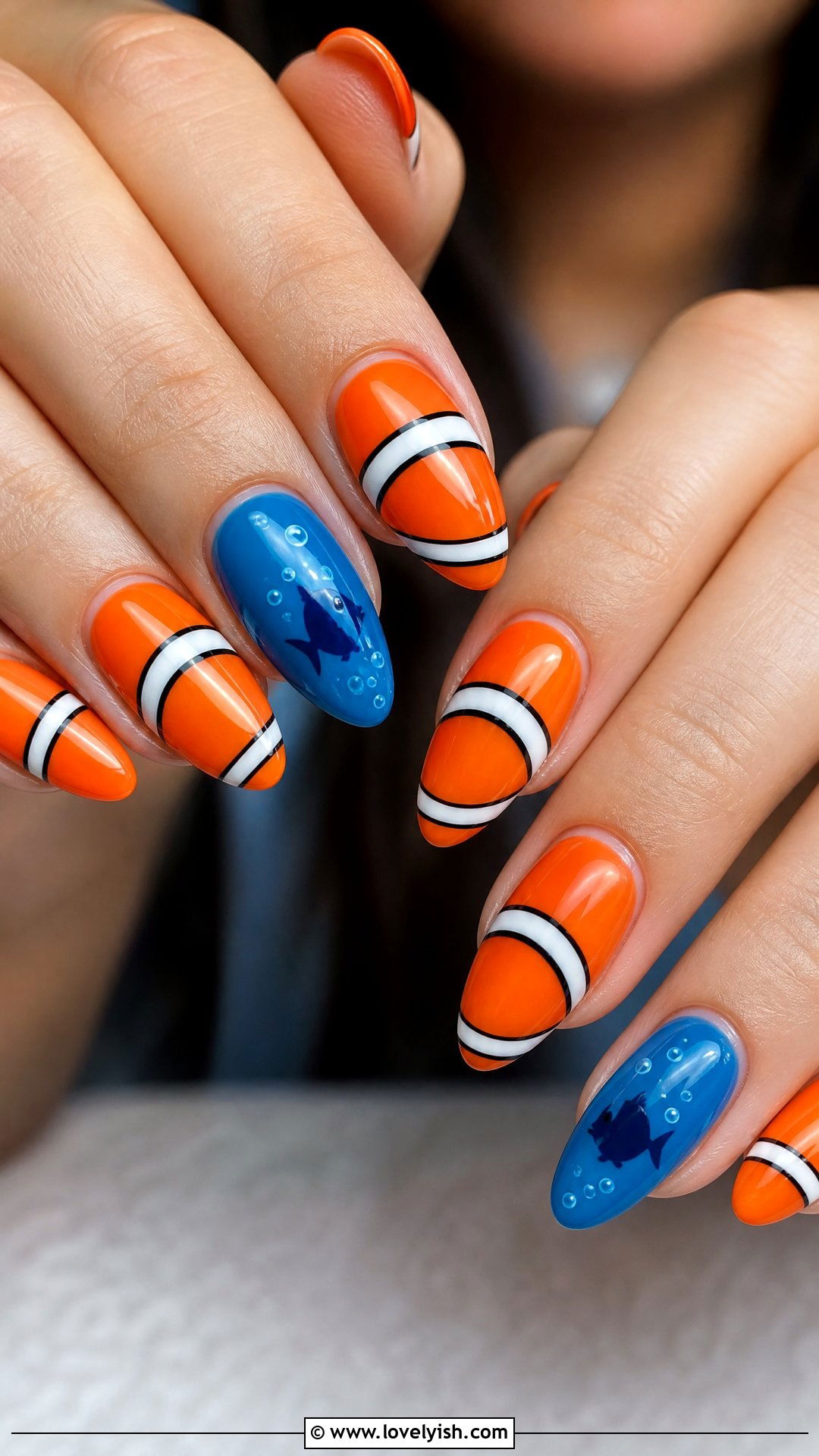 Finding Nemo Orange and White Stripe Nails - 50 disney nail designs - 50 disney nail designs