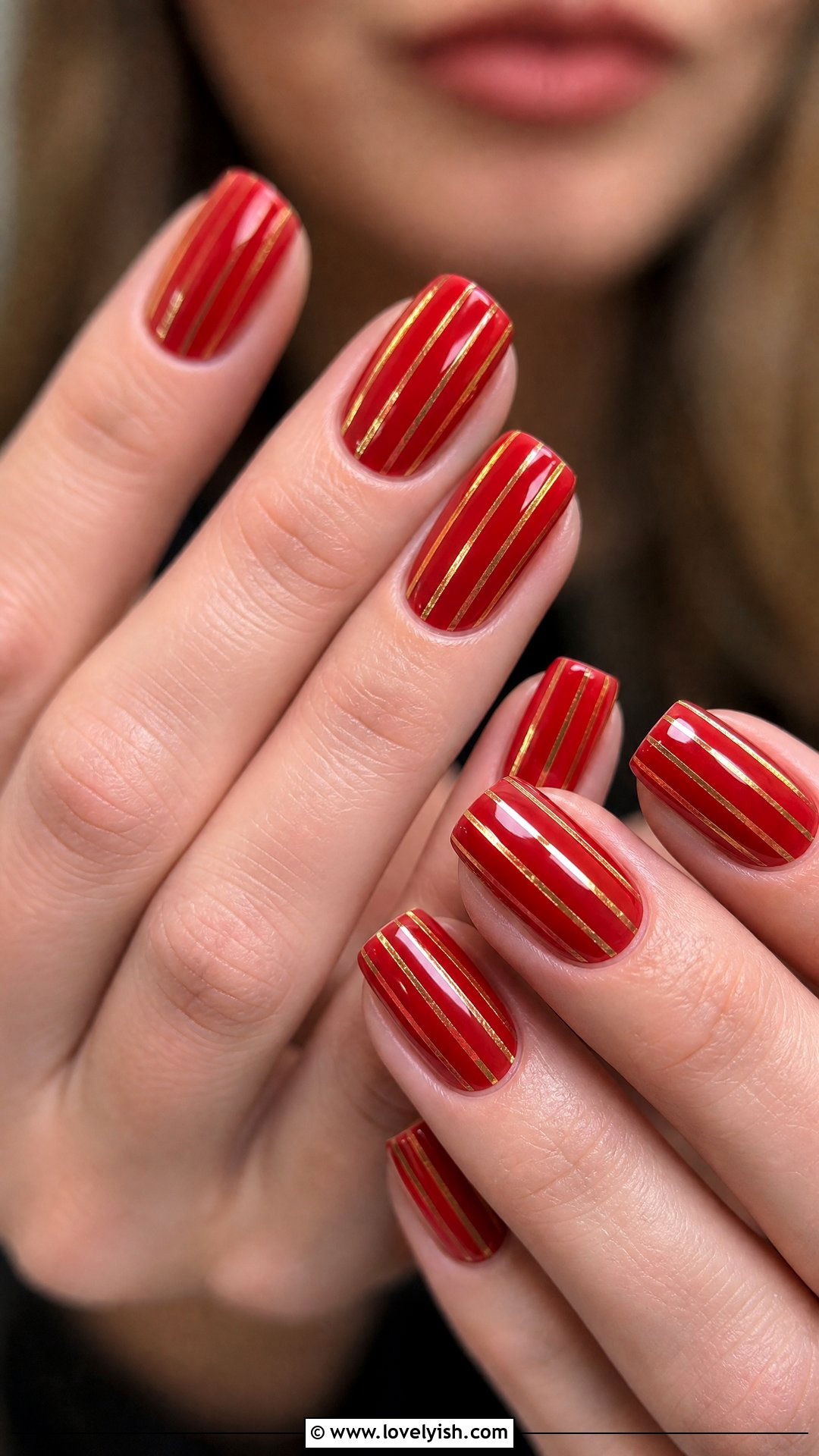 Glossy Red With Gold Pinstripes - 50 red and gold nail design ideas - 50 red and gold nail design ideas