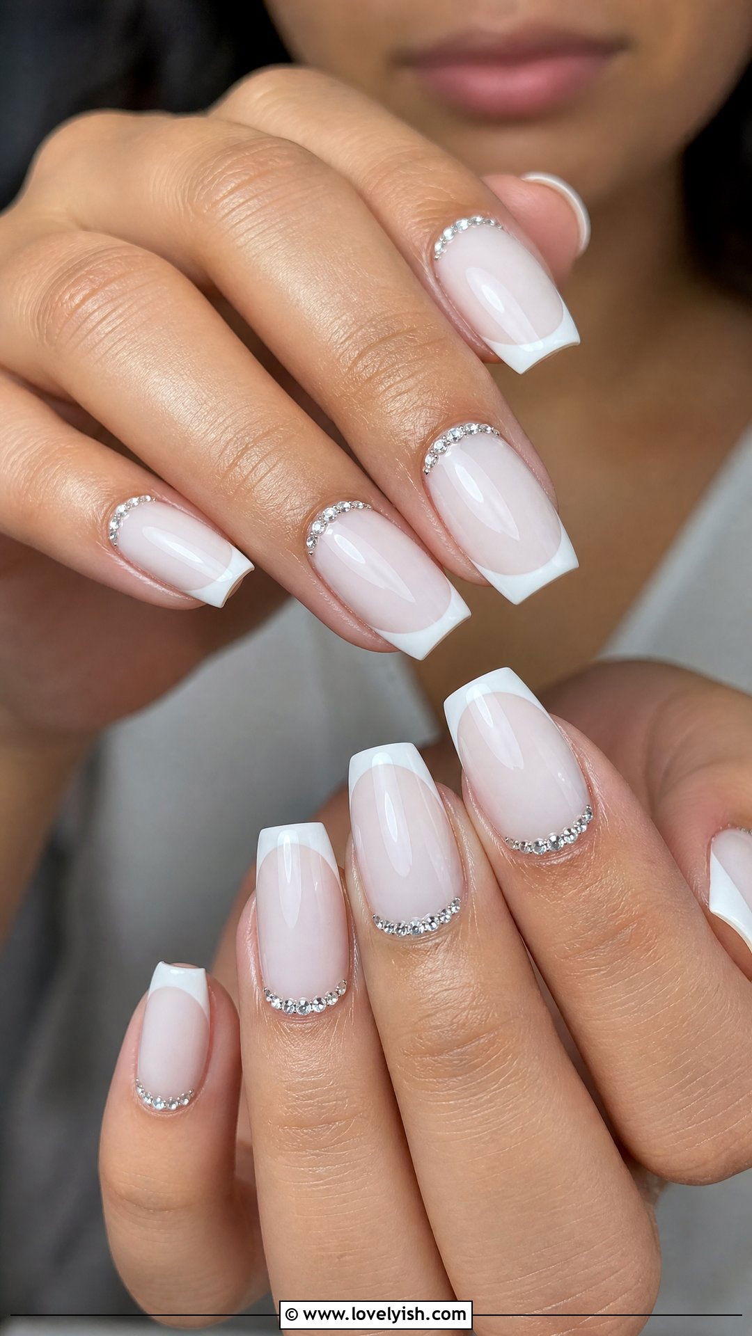 Milky White French Tips With Rhinestone Cuticle Accents - 29 nail designs with rhinestones - 29 nail designs with rhinestones