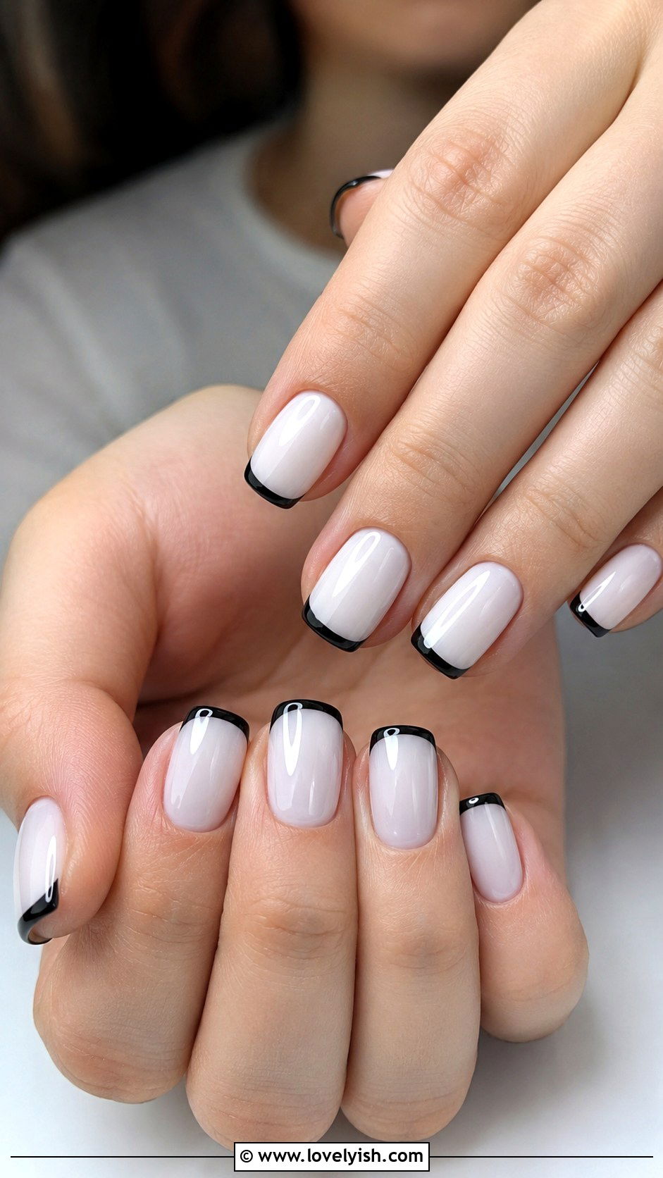 Milky White Nails with Black Tips - 33 minimalist nail designs - 33 minimalist nail designs