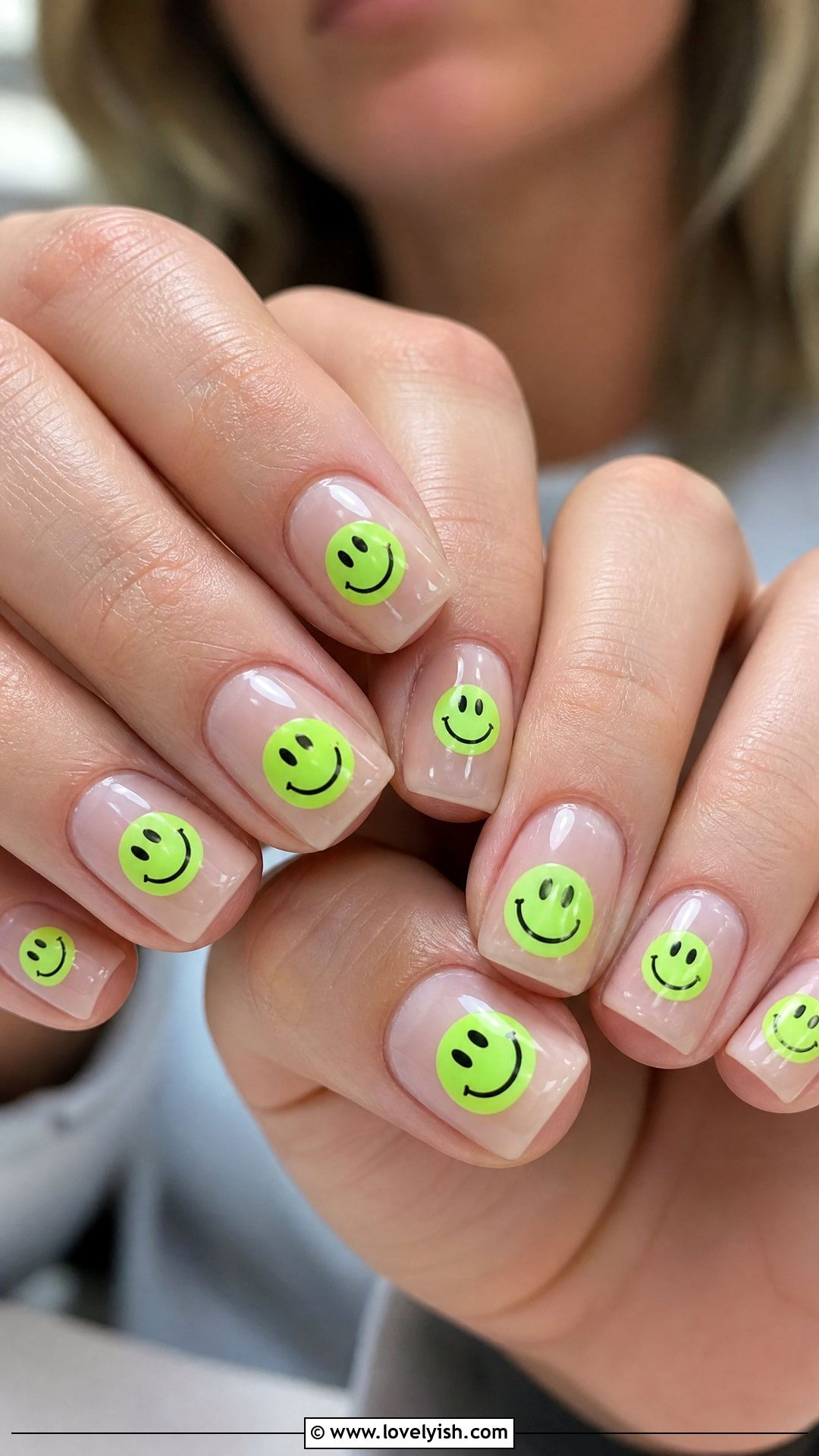 neon green smiley face nails