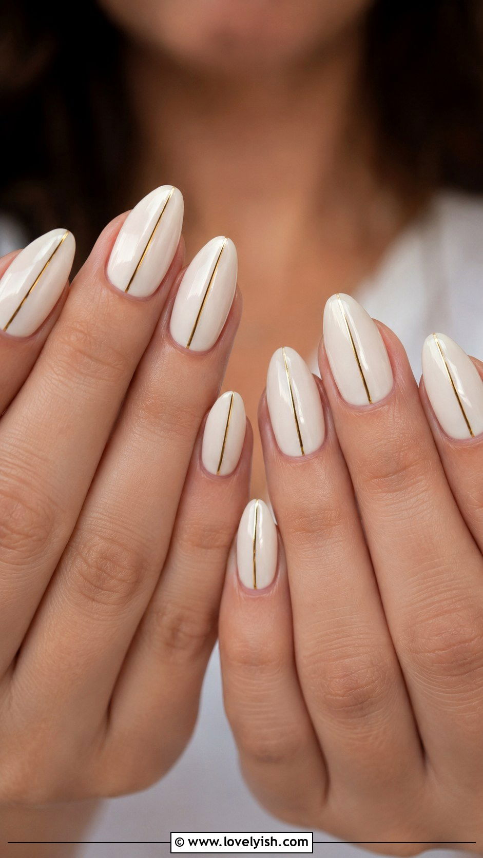 Off White Nails with Thin Vertical Stripe - 33 minimalist nail designs - 33 minimalist nail designs