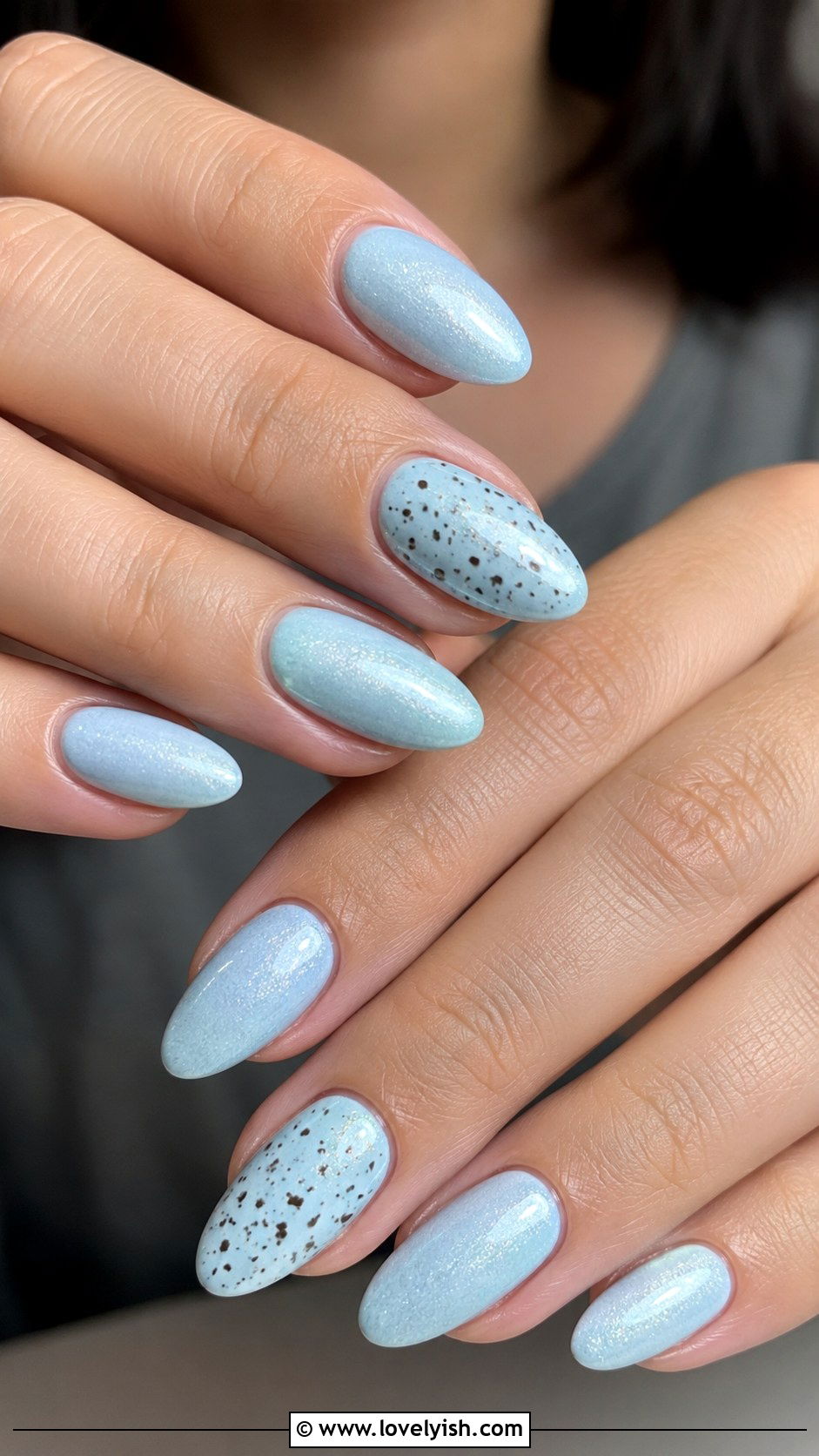 Pastel Blue Easter Nails with Speckled Accents - 38 easter nail art ideas - 38 easter nail art ideas
