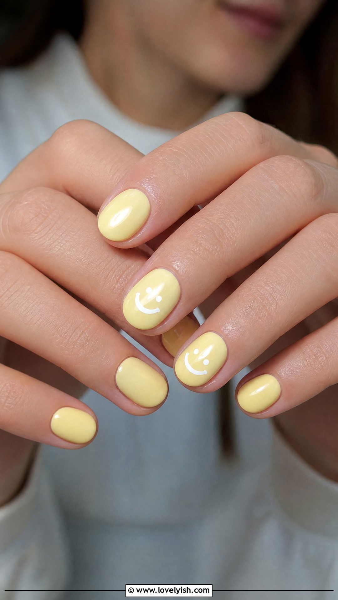 Pastel Yellow Smiley Nails - 42 spring nail ideas - 42 spring nail ideas