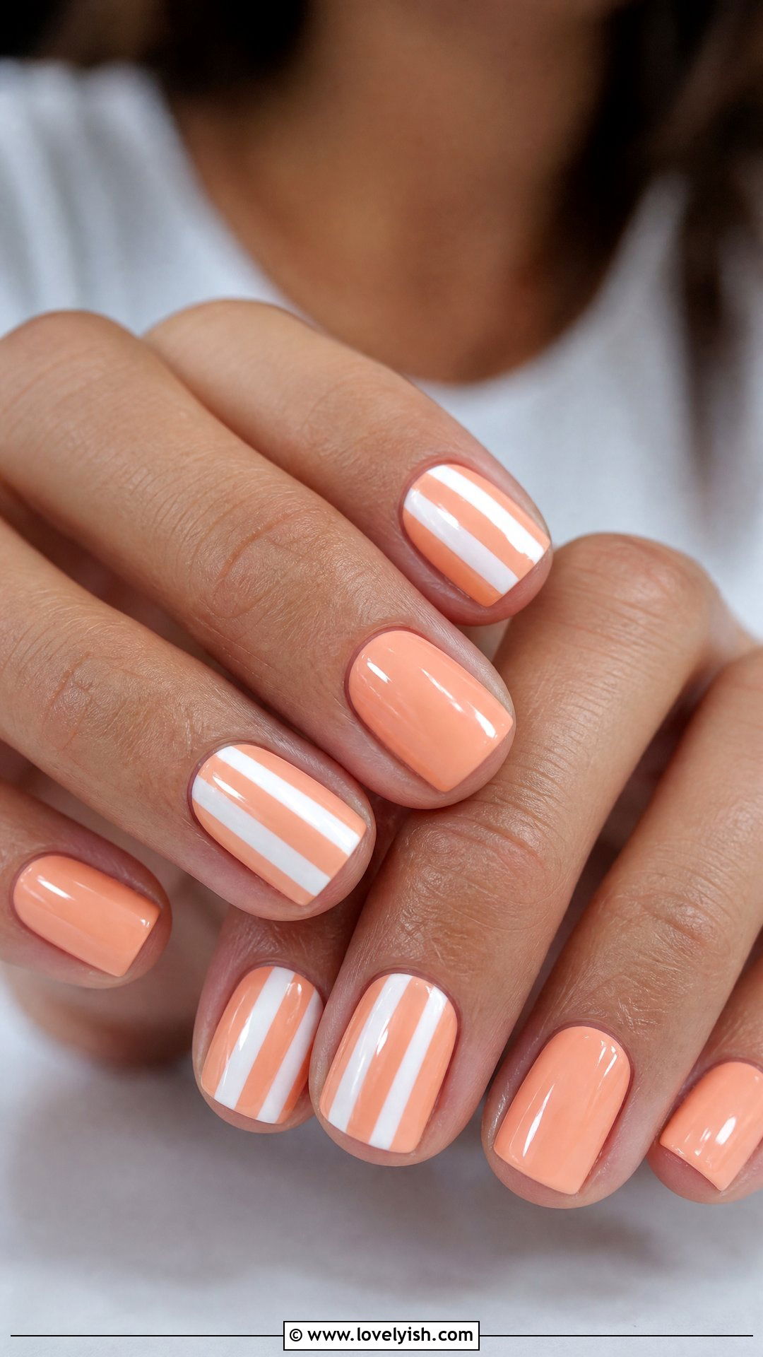 Peach and White Striped Nails - 25 preppy nail designs - 25 preppy nail designs