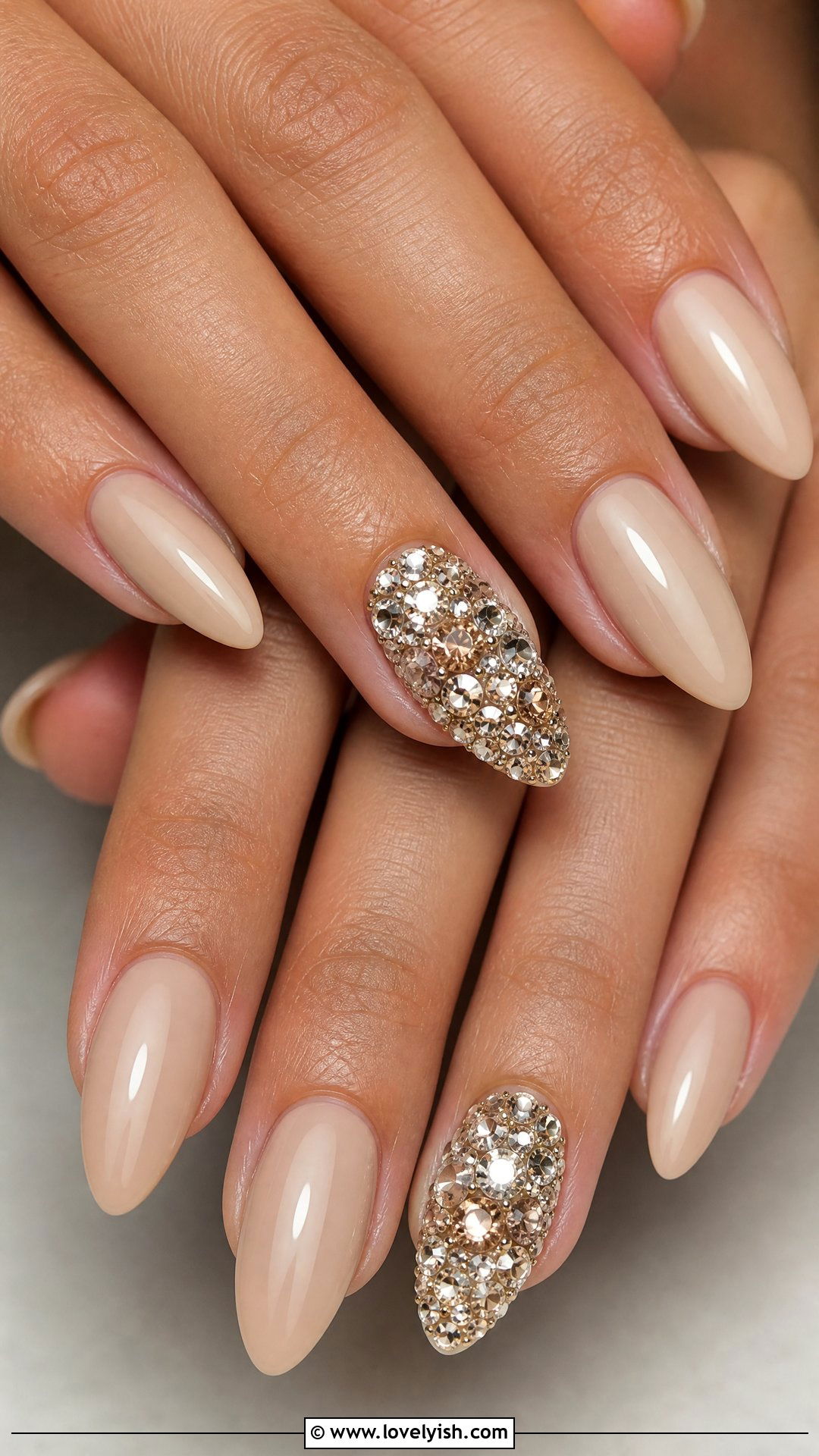 Sheer Nude With Encrusted Rhinestone Ring Finger - 29 nail designs with rhinestones - 29 nail designs with rhinestones