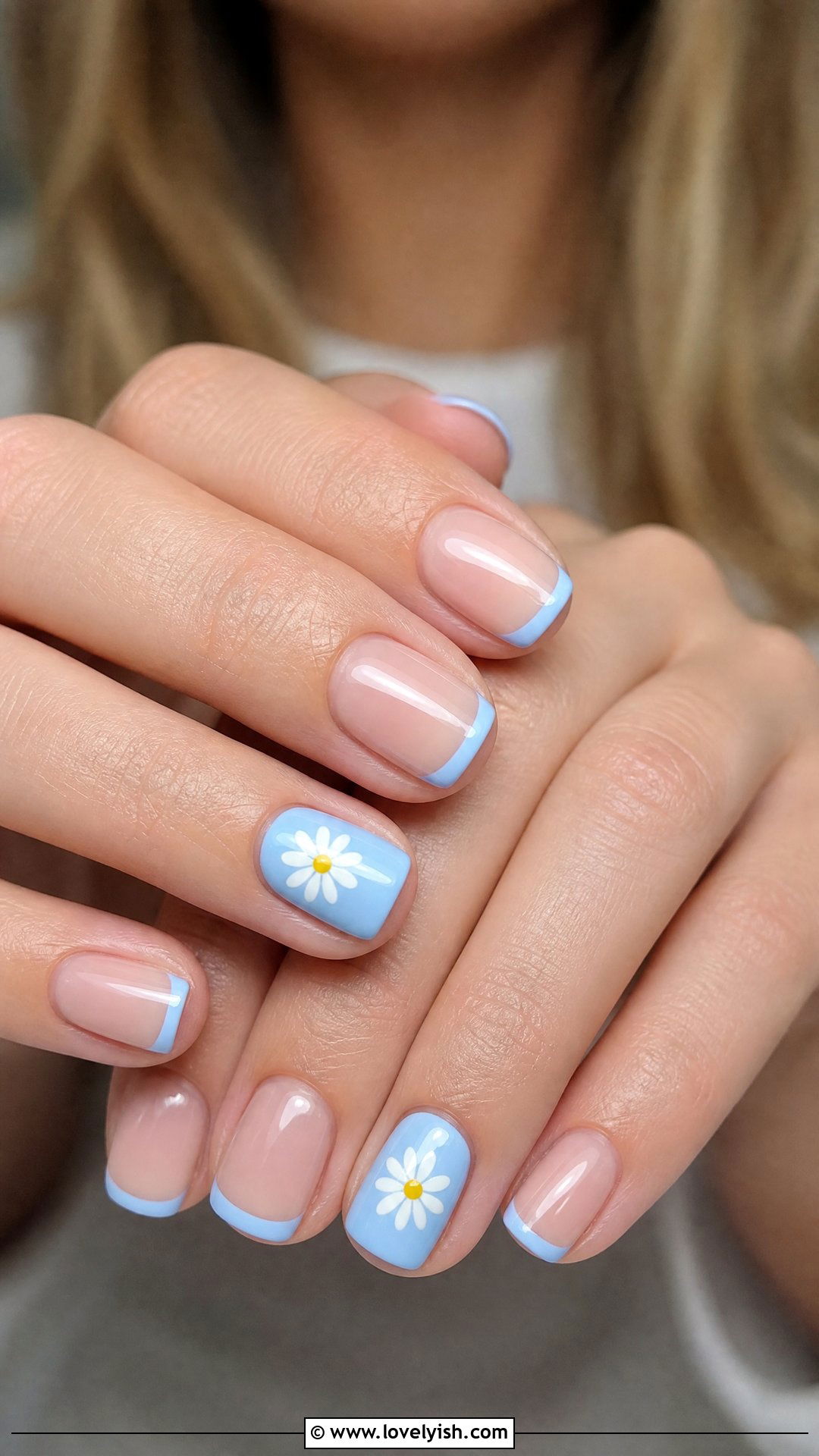 Sky Blue French Tips With Daisy Accents - 28 spring nails design ideas - 28 spring nails design ideas
