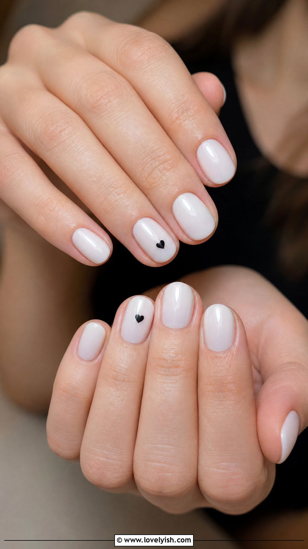 Tiny Black Heart Accent Nails - 42 minimalist nail art - 42 minimalist nail art
