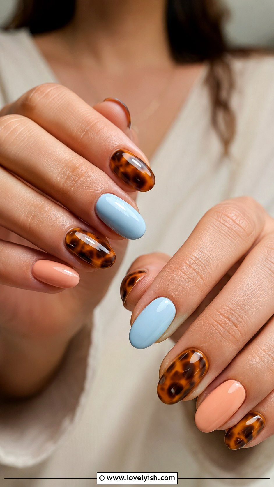 Tortoiseshell Nails With Pastel Accents - 50 tortoise nail design ideas - 50 tortoise nail design ideas