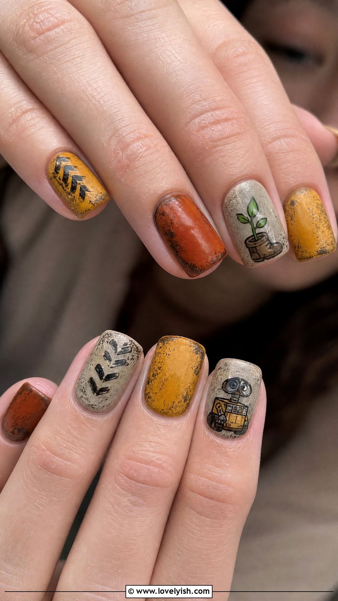 Wall E Yellow and Rust Nails - 50 disney nail designs - 50 disney nail designs