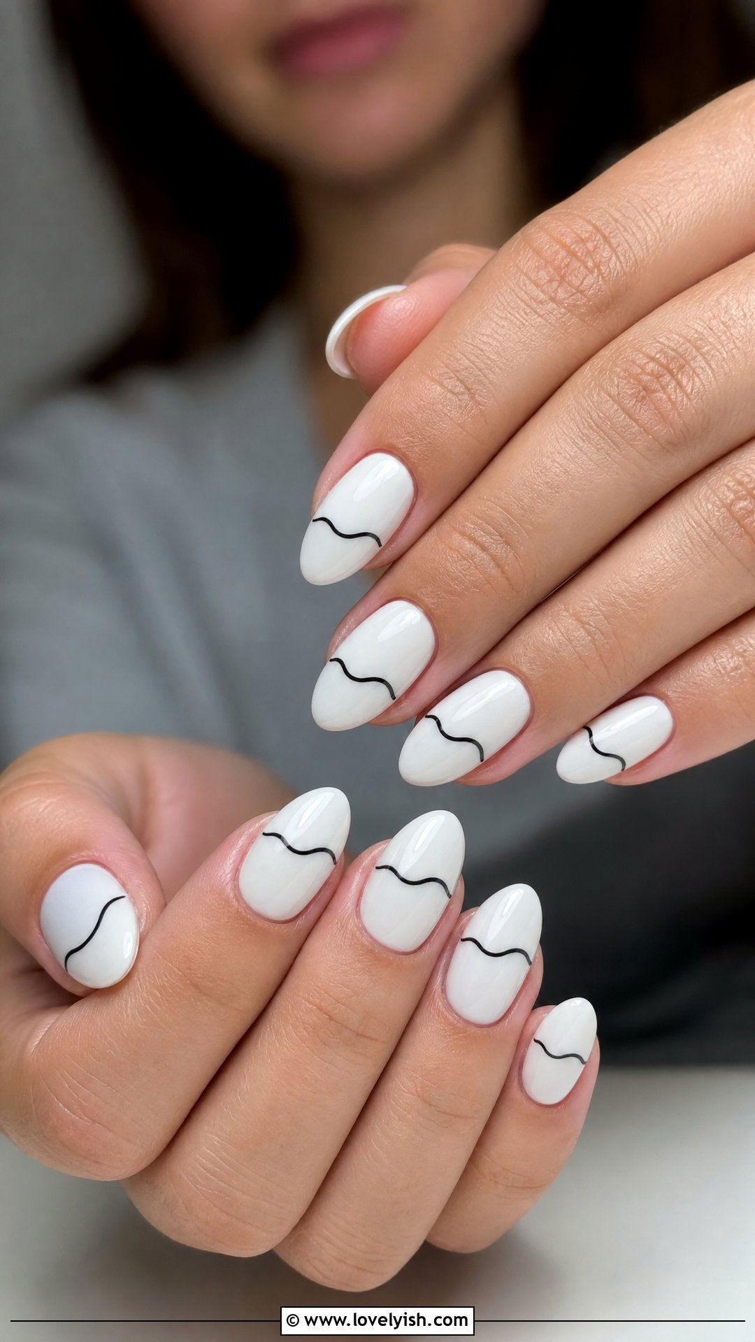 White Nails with Wavy Black Line - 33 minimalist nail designs - 33 minimalist nail designs